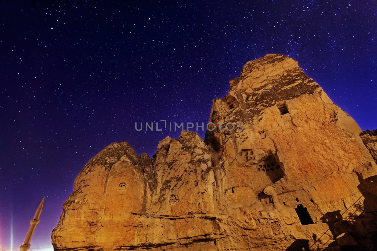 Cylindrical stone cliffs and cave houses in Goreme, Turkey