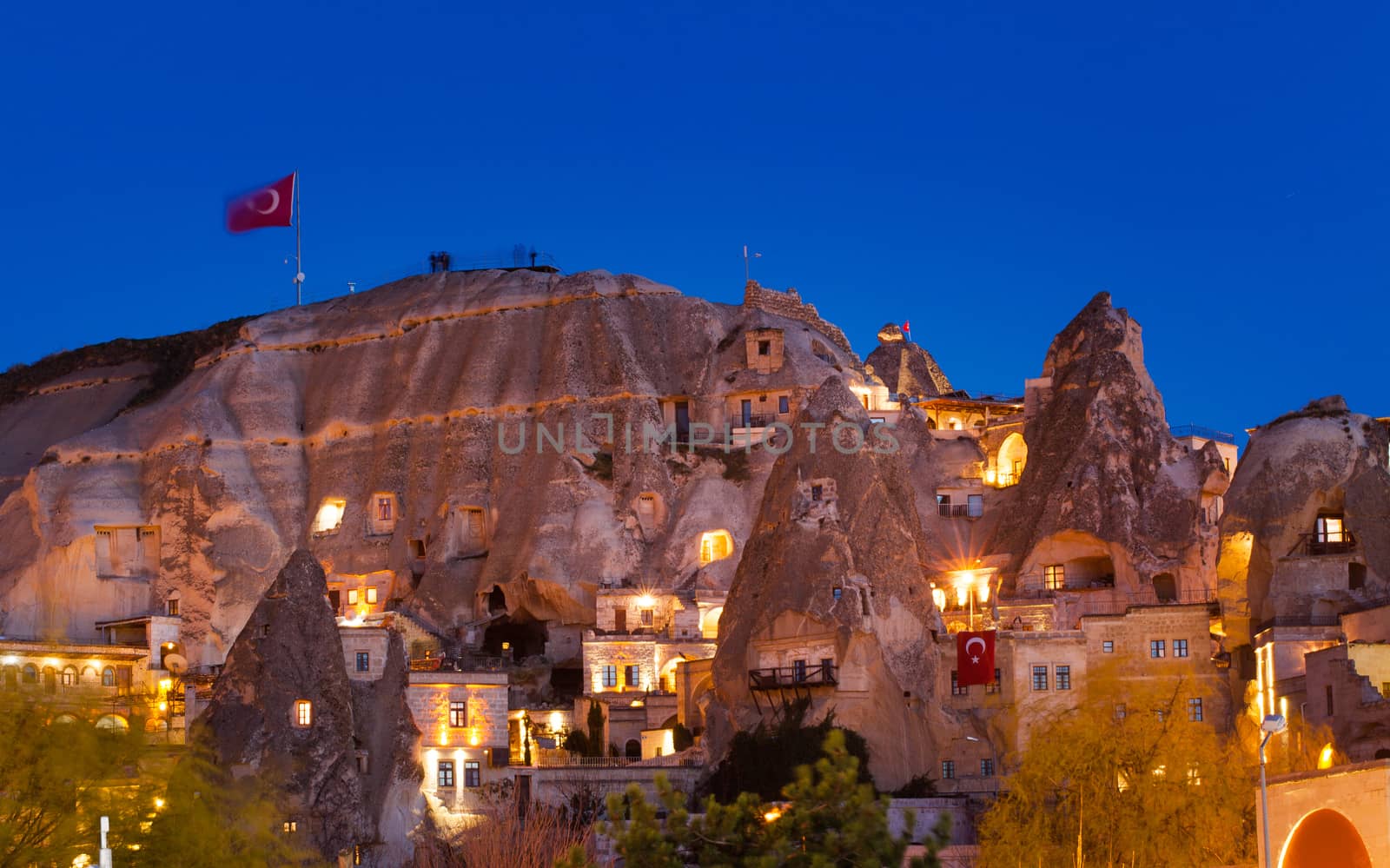 Cylindrical stone cliffs and cave houses in Goreme, Turkey