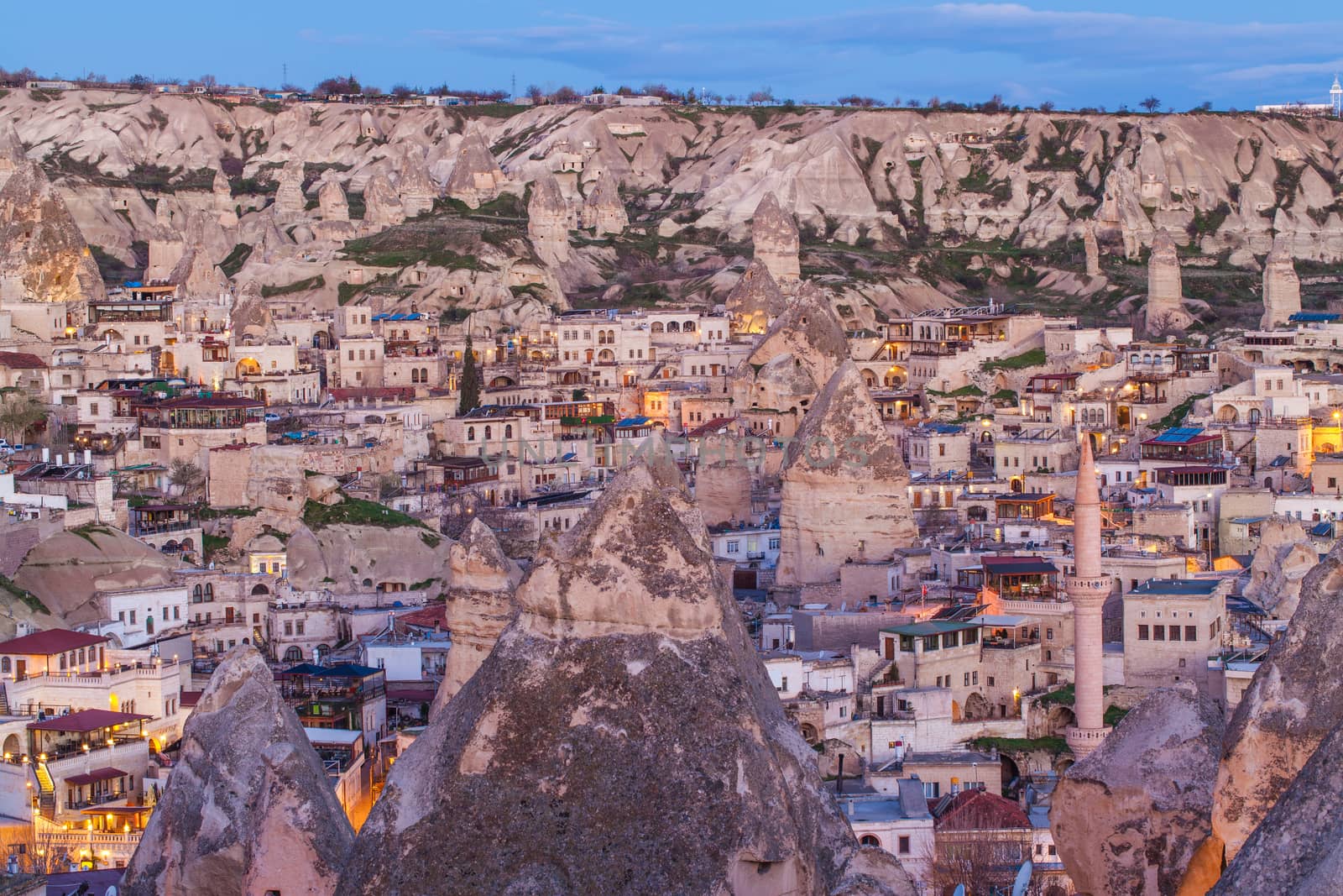 Cylindrical stone cliffs and cave houses in Goreme, Turkey