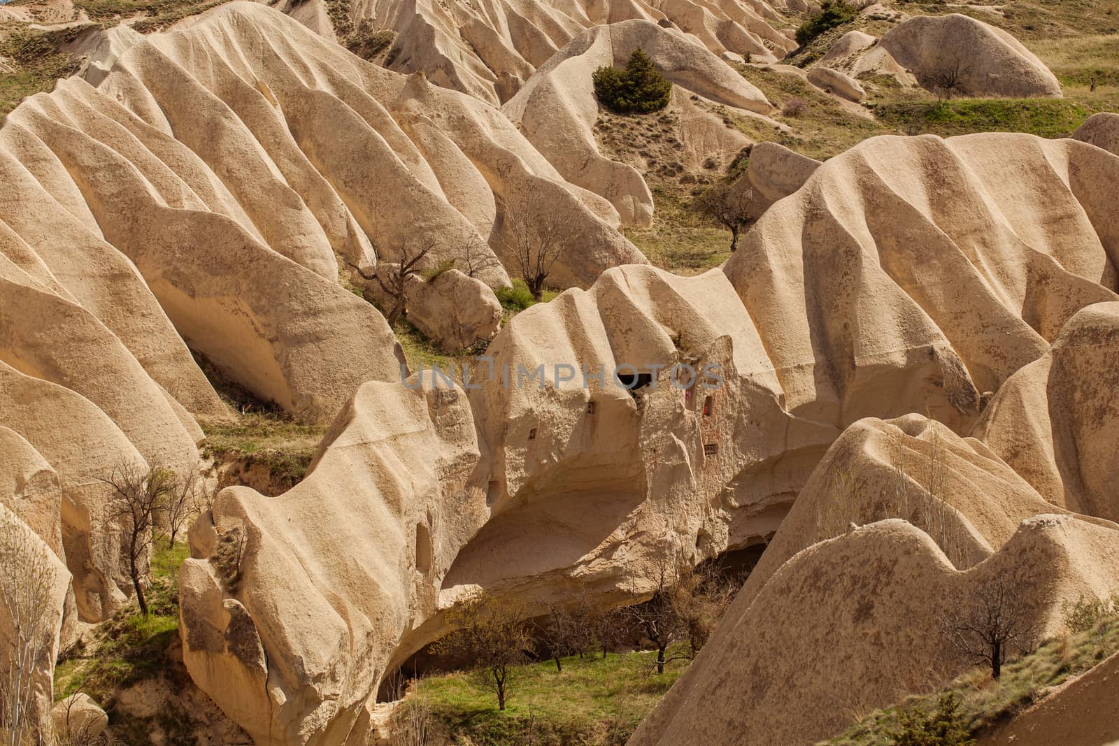 Beautiful stone cliffs in valley named Rose valley near Meskendir, Goreme, Turkey