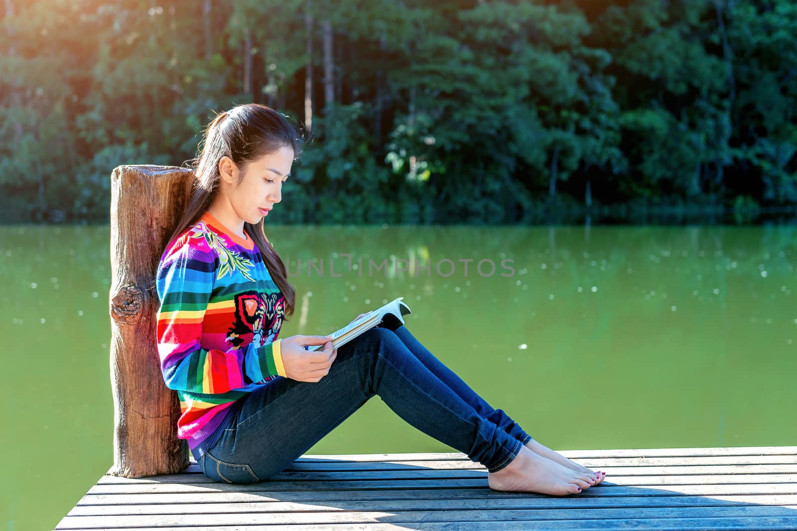 Beautiful girl reading a book.