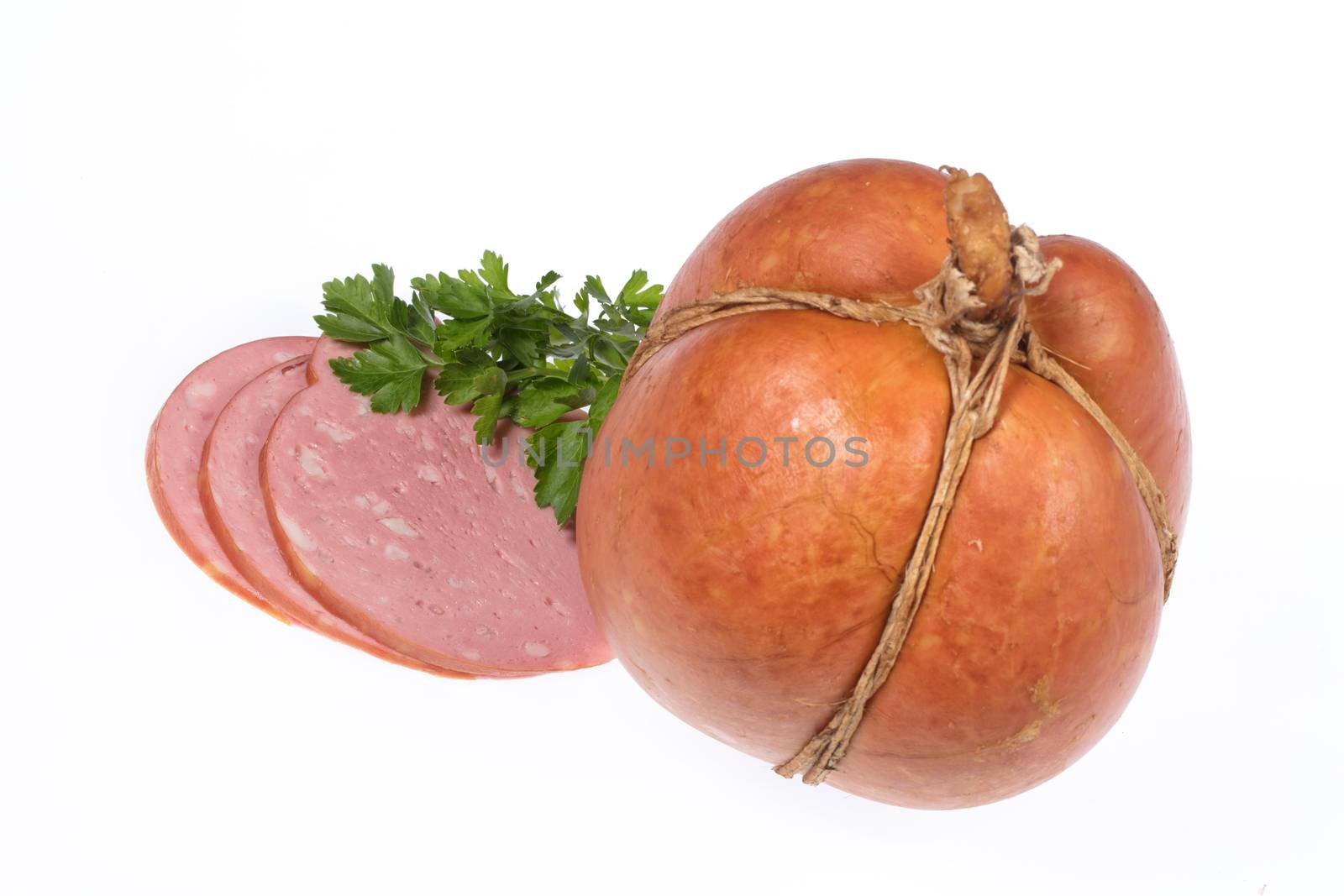 Sausge with greenery on an isolated studio background