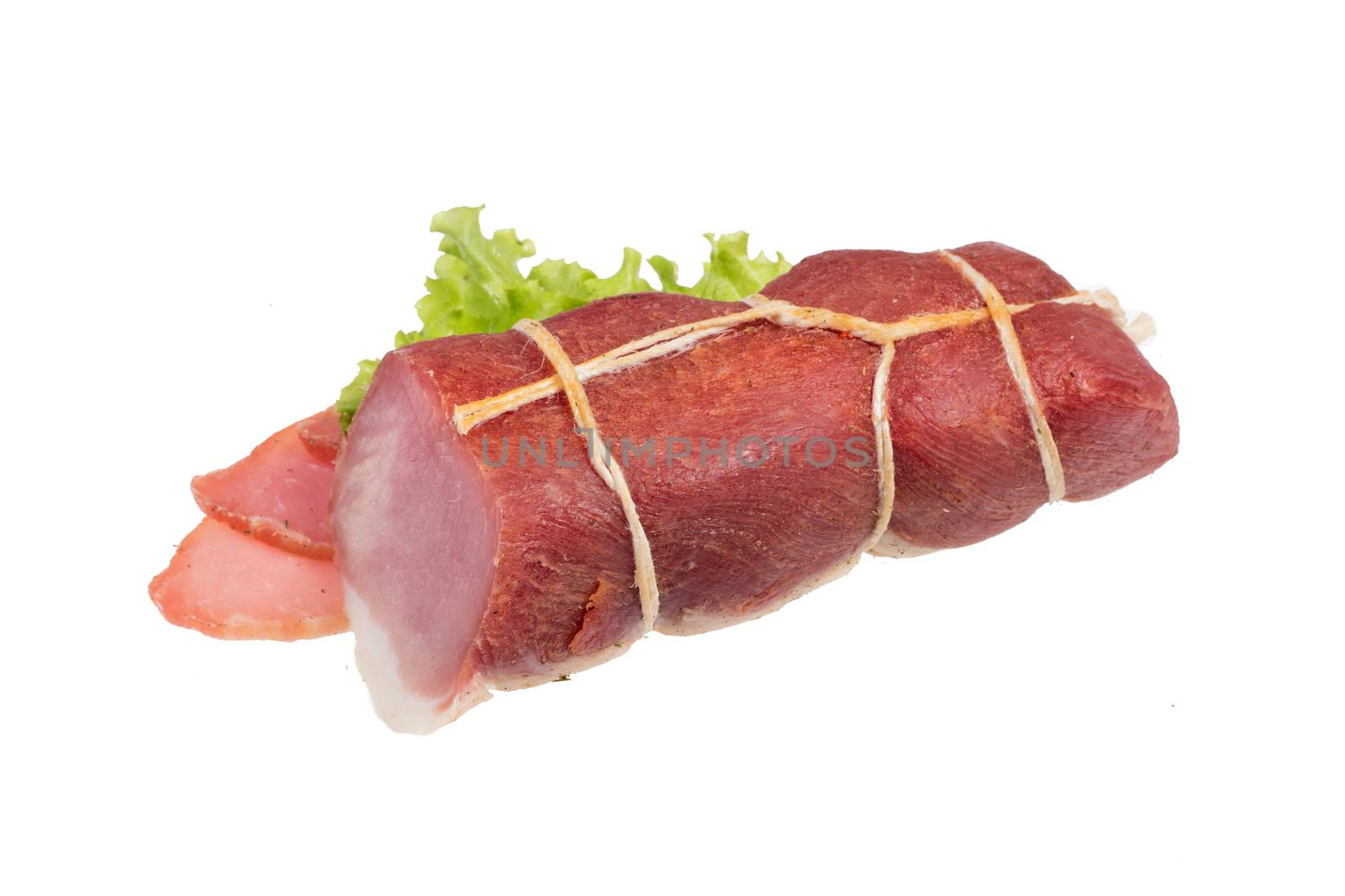 Meat and greenery on an isolated studio background