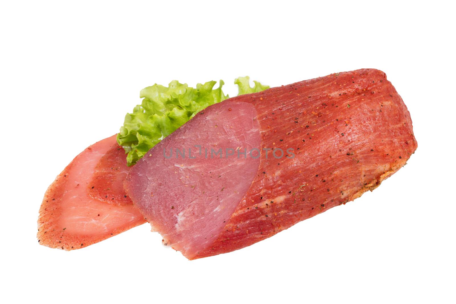 Meat and greenery on an isolated studio background