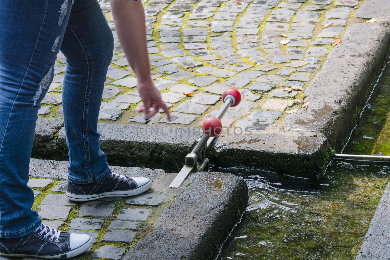 Small water lock Hand operated on a children's playground