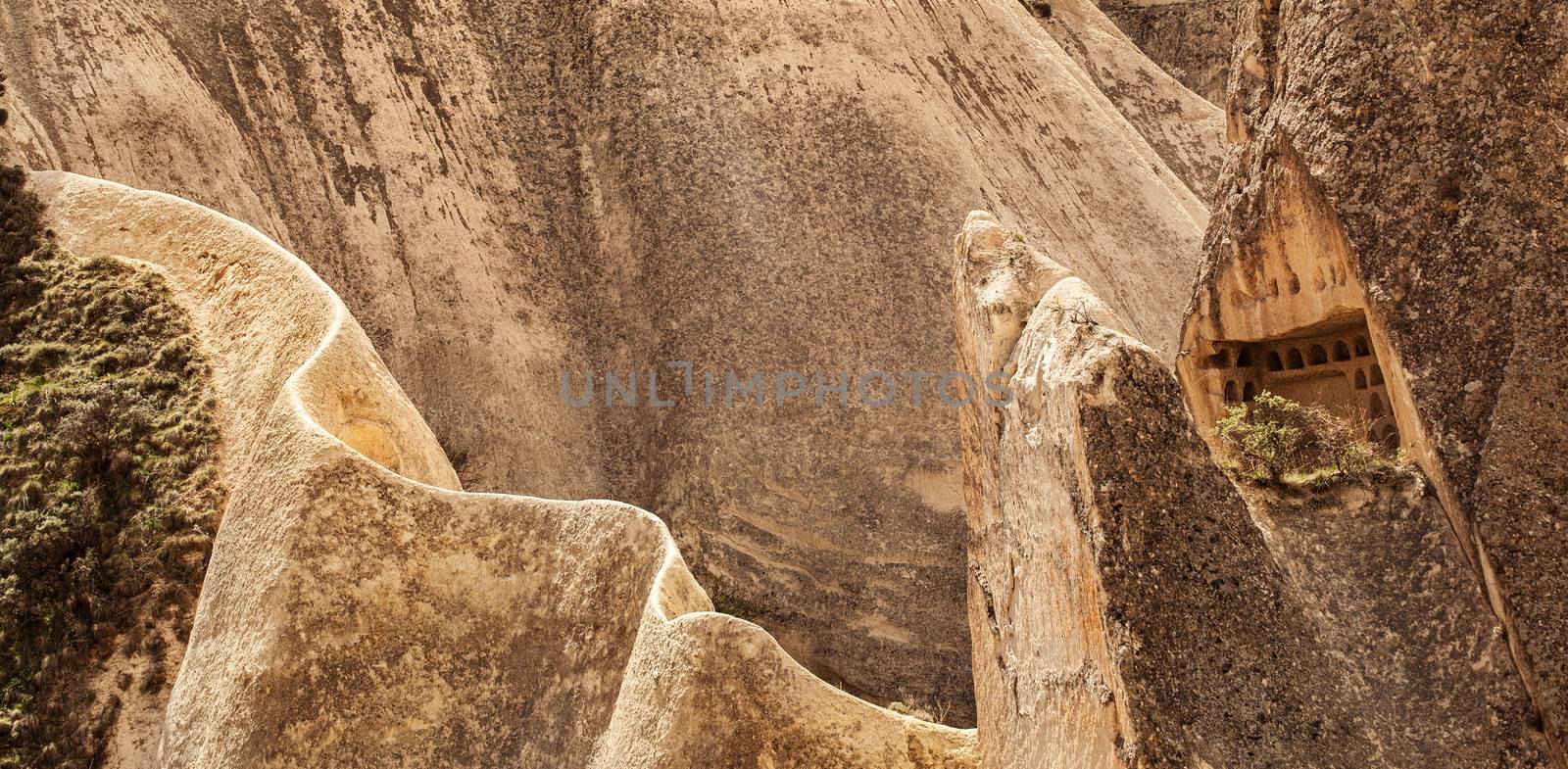 Beautiful stone cliffs in valley named Rose valley near Meskendir, Goreme, Turkey