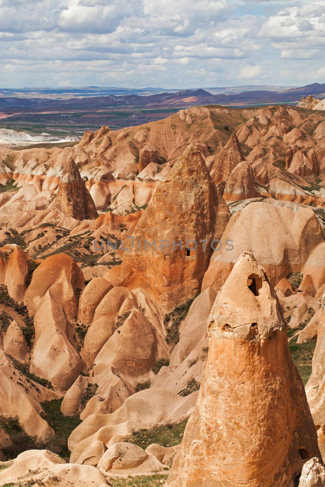 Beautiful stone cliffs in valley named Rose valley near Meskendir, Goreme, Turkey