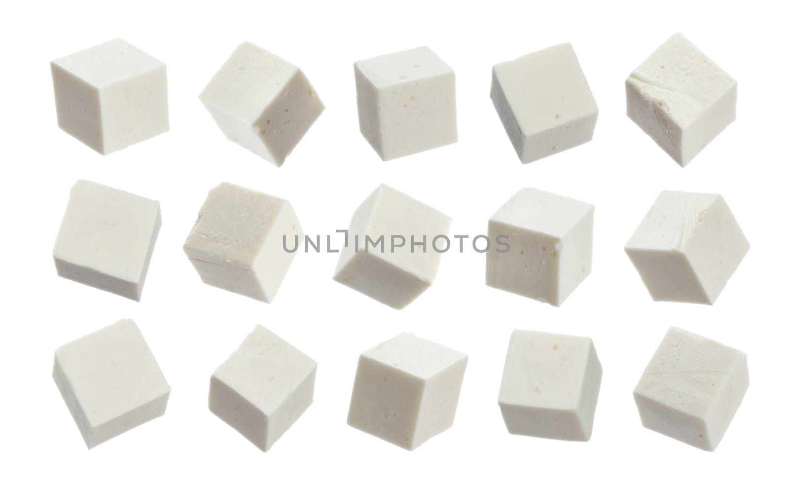 Greek feta cubes. Diced soft cheese isolated on white background by xamtiw