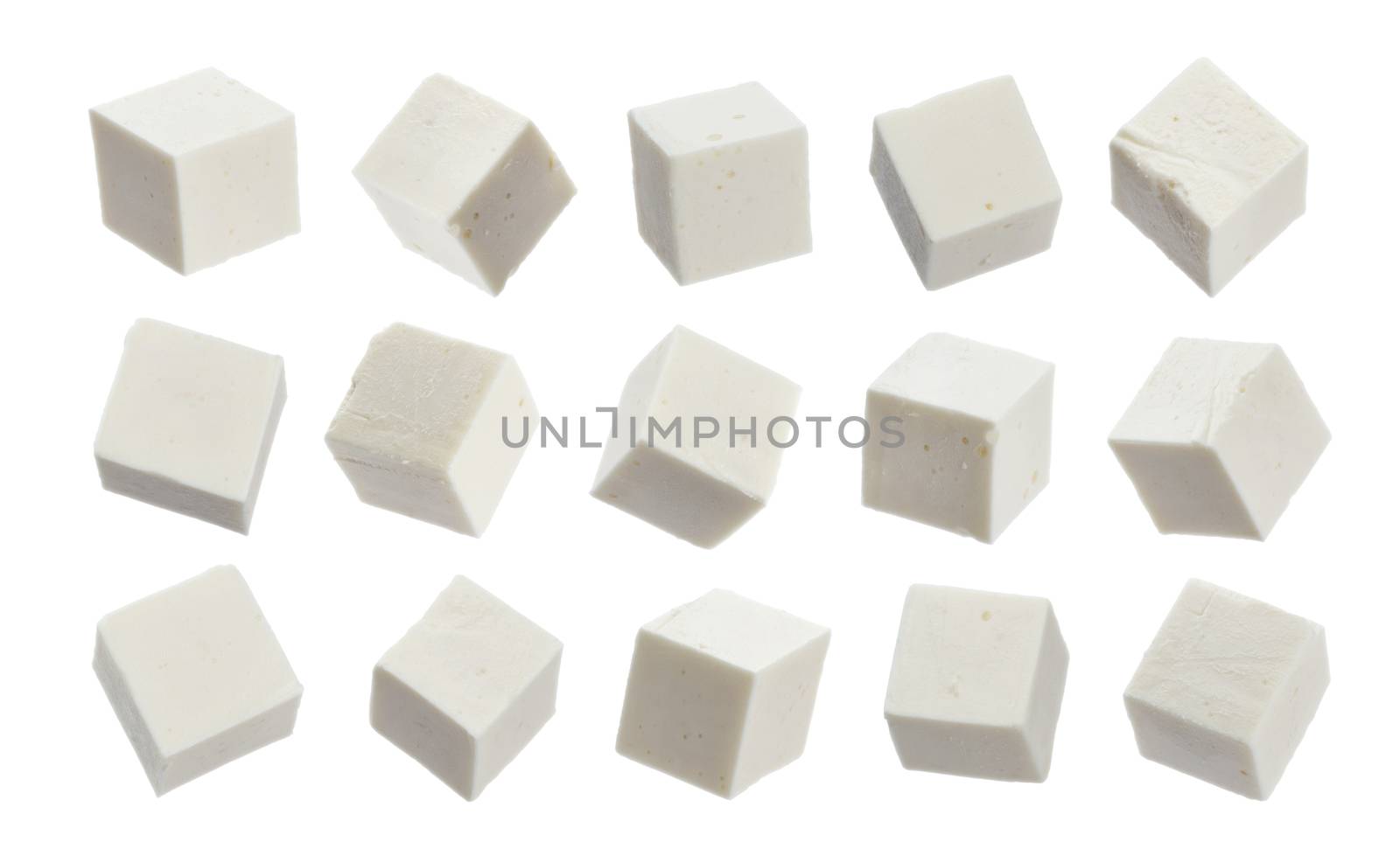 Greek feta cubes. Diced soft cheese isolated on white background with clipping path