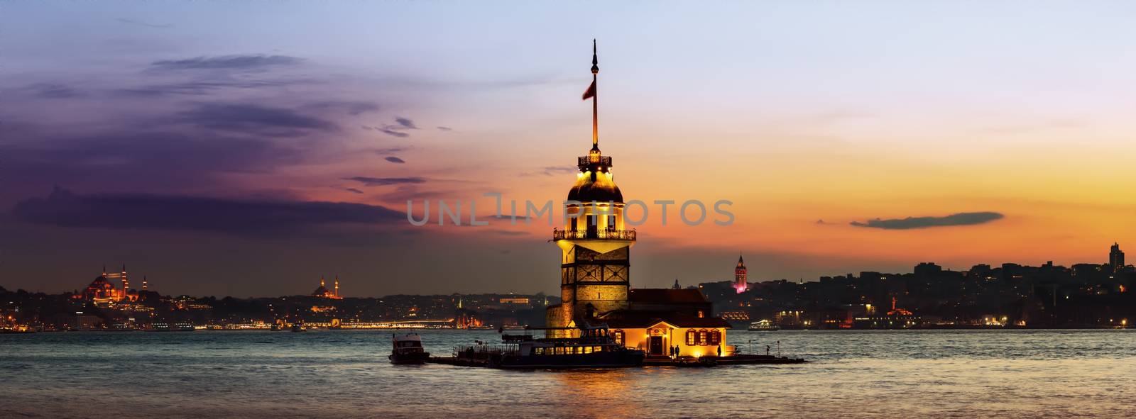 Maiden Tower in Bosforus illuminated at sunset, Istanbul