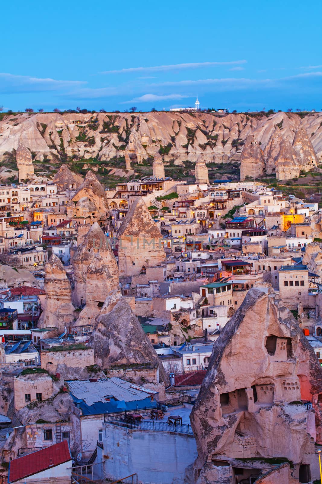 Cylindrical stone cliffs and cave houses in Goreme, Turkey