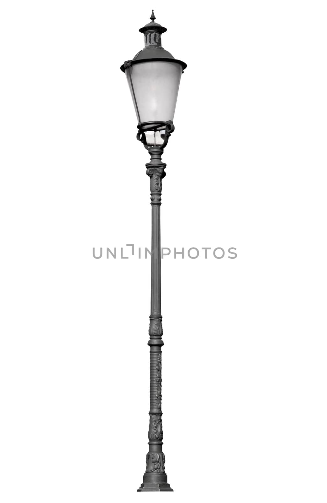 An old street lamppost isolated over white