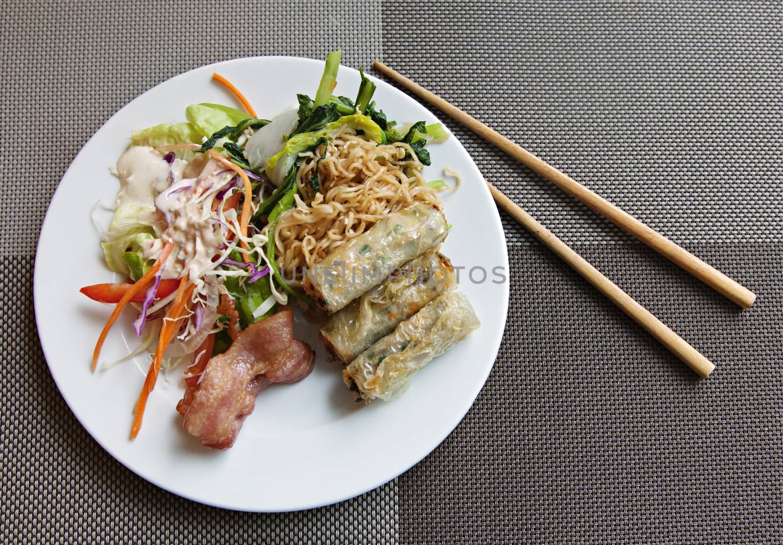Vietnamese breakfast on a plate with chopsticks