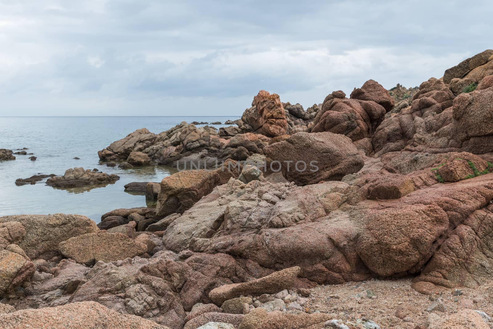 the rocks of isola rossa sardinia by compuinfoto