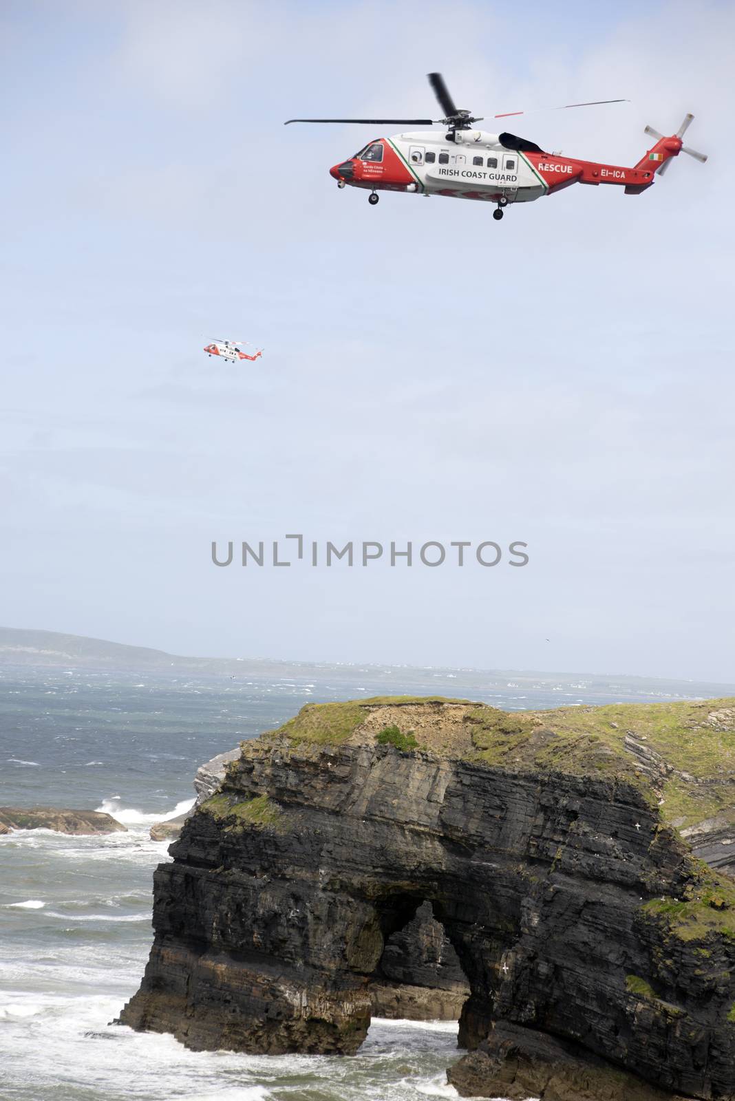 two irish search and rescue helicopters at the virgin rock by morrbyte