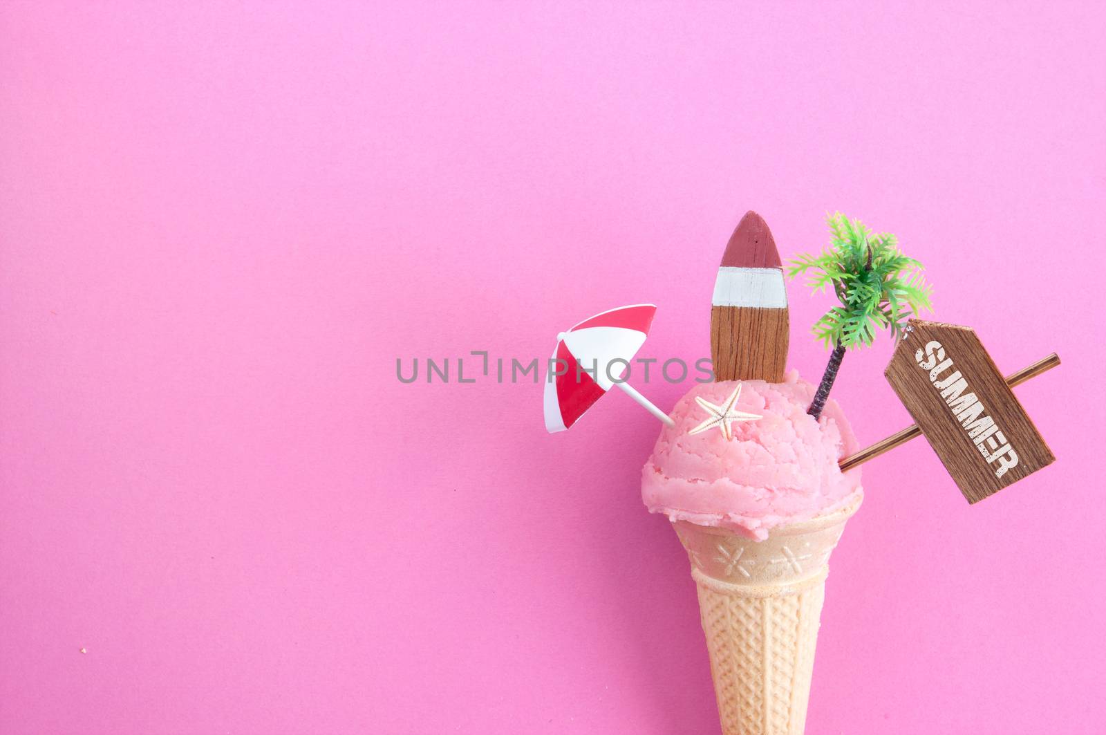 Strawberry icecream with beach sign, parasol, surfboard and pine tree
