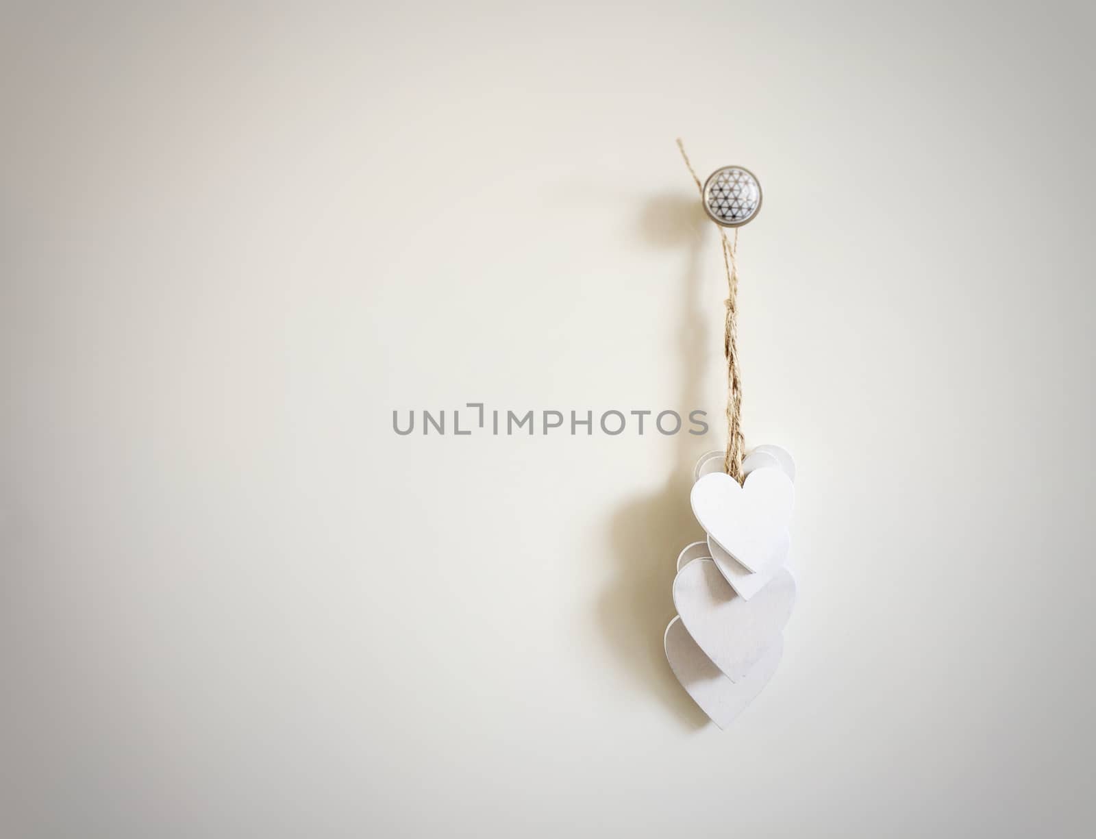 Group of white wooden hearts hanging