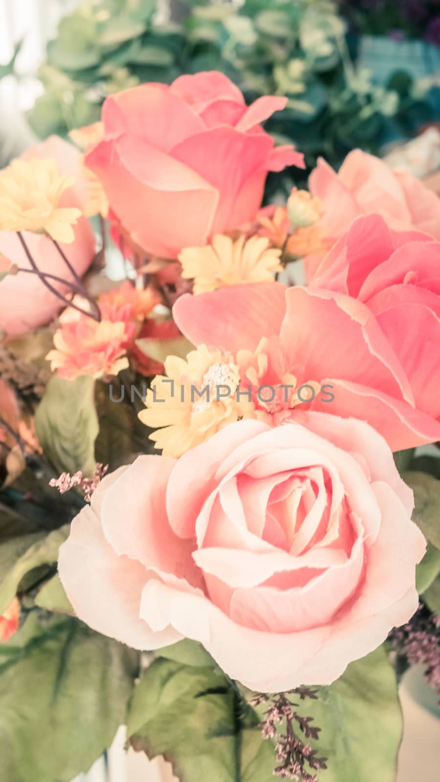 colorful of the plastic flowers bouquet , soft of focus