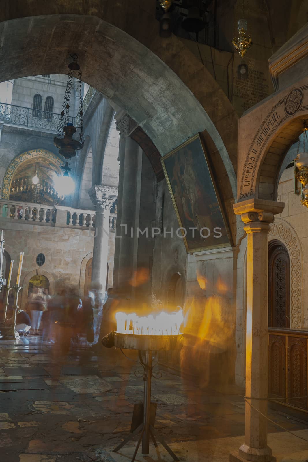 Piligrims praying in Church of the Holy Sepulchre