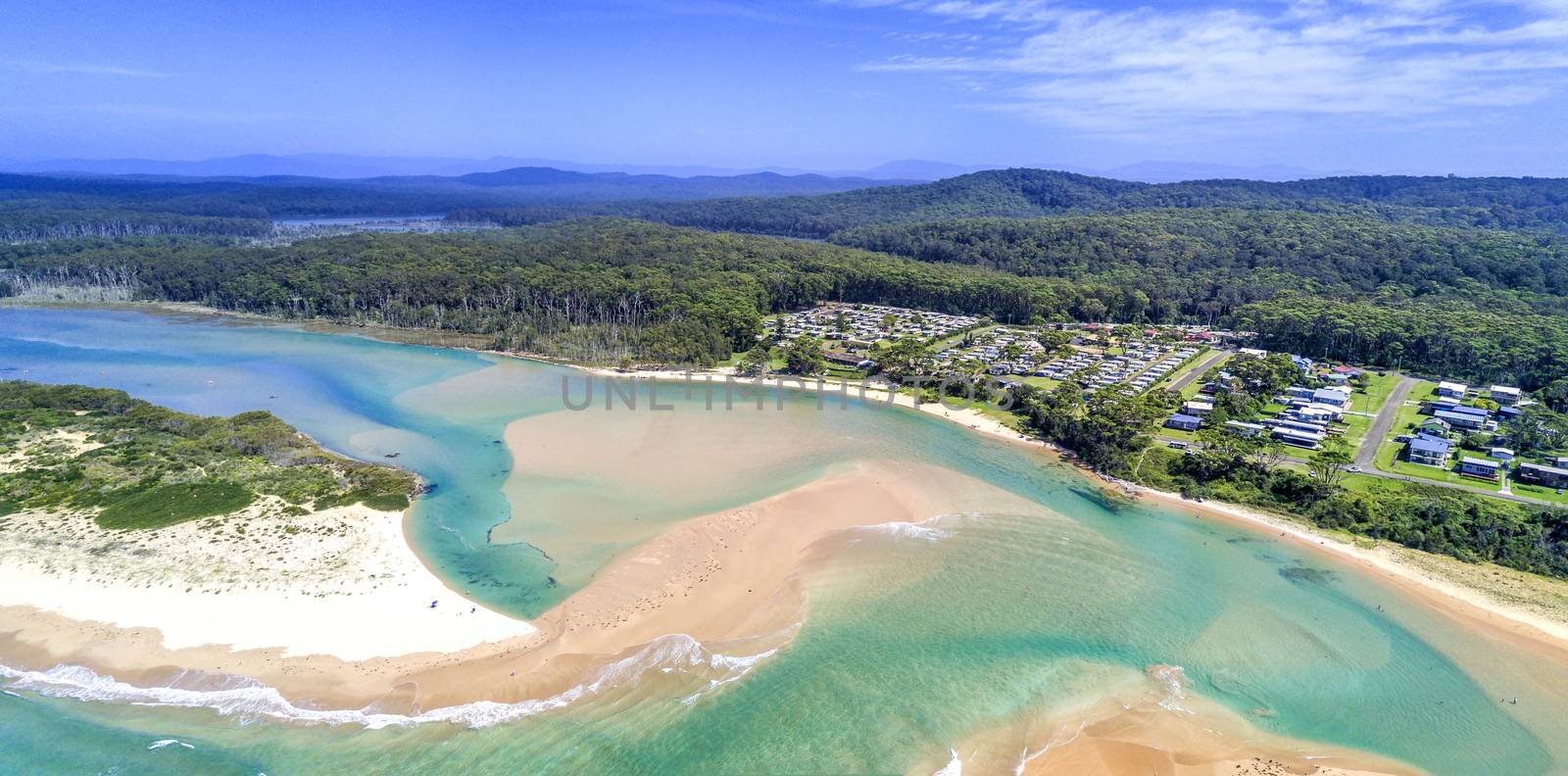 Durras Inlet separates North and South Durras townships.  In view is the popular Durras Lake North Park in Murramarang National Park, a great holiday vacation spot.