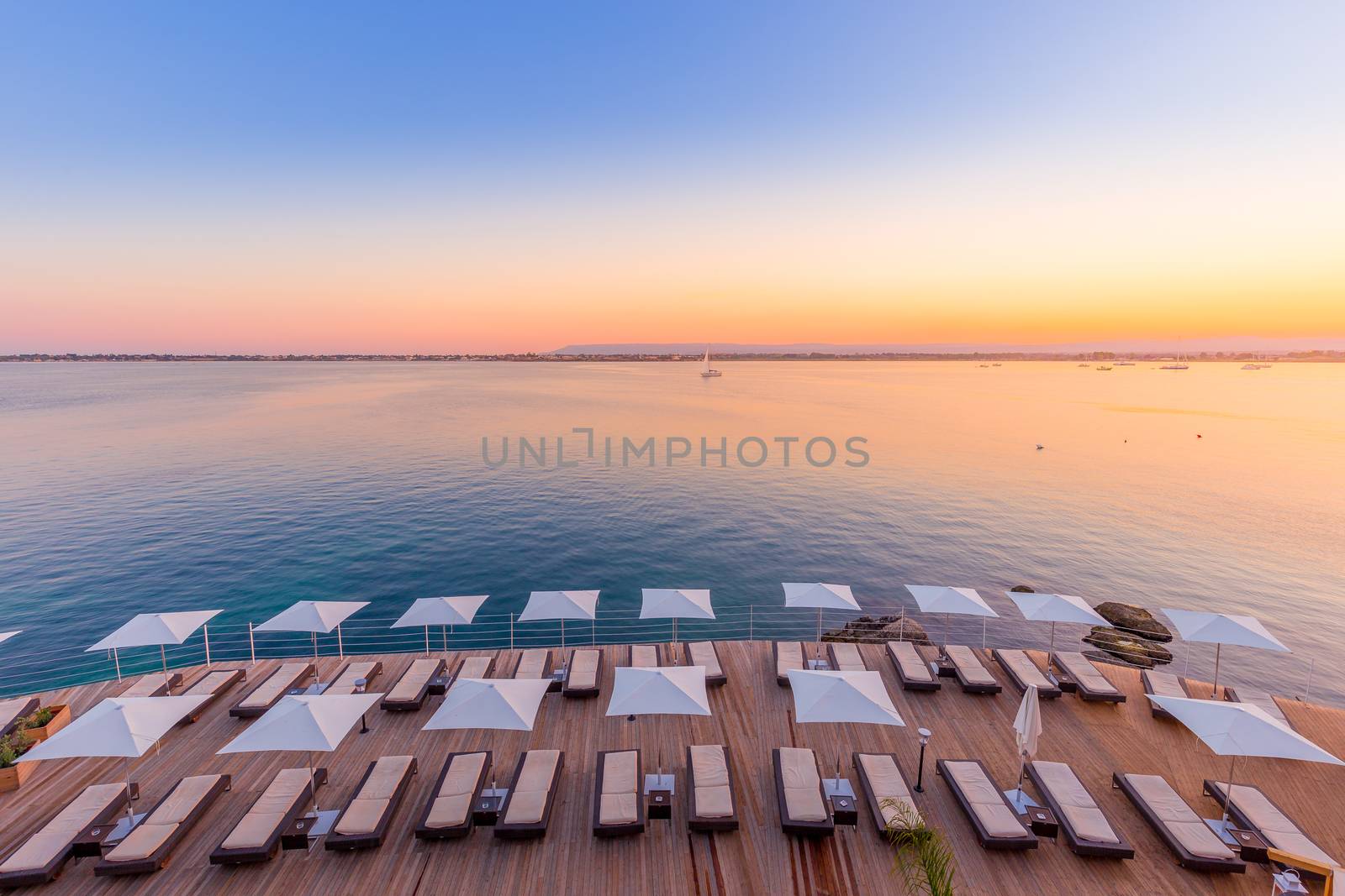 SYRACUSE, ITALY - sunset in front of the sea by Perseomedusa