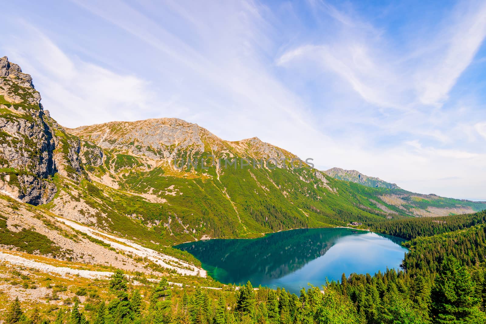 View from the height of the picturesque clear mountain lake Morskie Oko in the Tatra Mountains, Zakopane