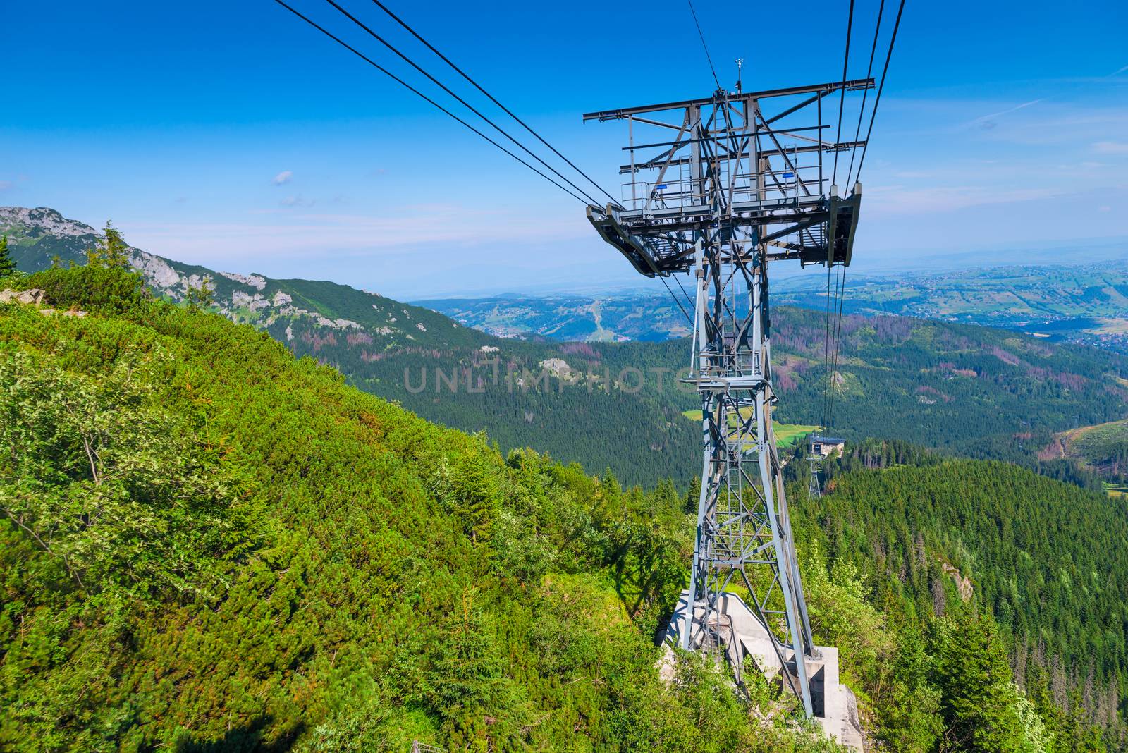 Metal support for the funicular on the background of beautiful mountains in Zakopane, Poland