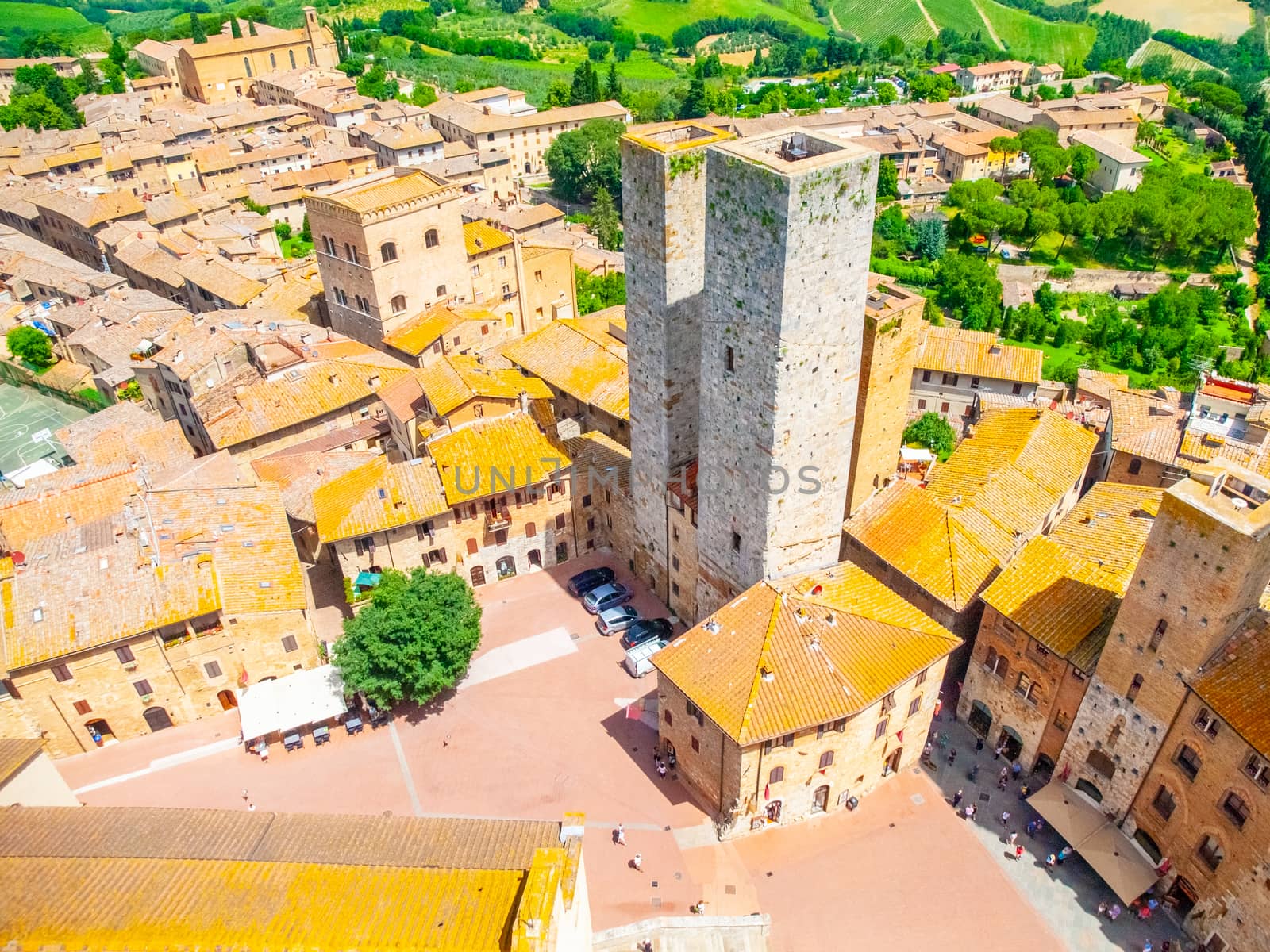 Aerial view of San Gimignano historical city centre with twin towers - Torri dei Salvucci, Tuscany, Italy.