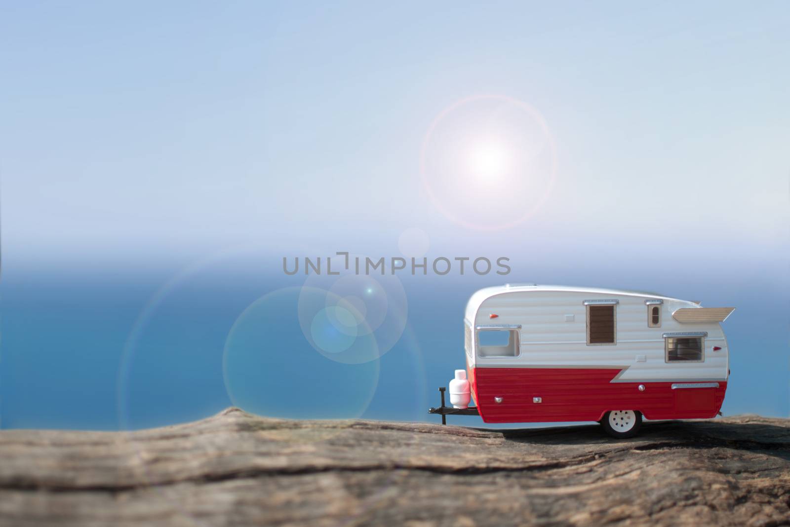 Miniature camper trailer with view of the sea