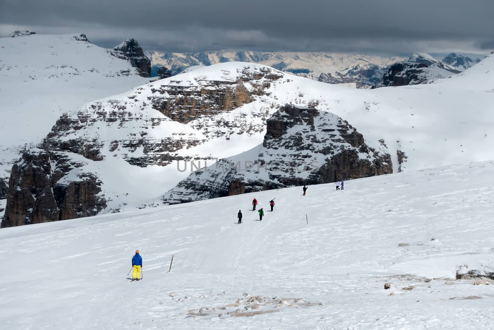 People Skiing from Sass Pordoi in the Upper Part of Val di Fassa by phil_bird