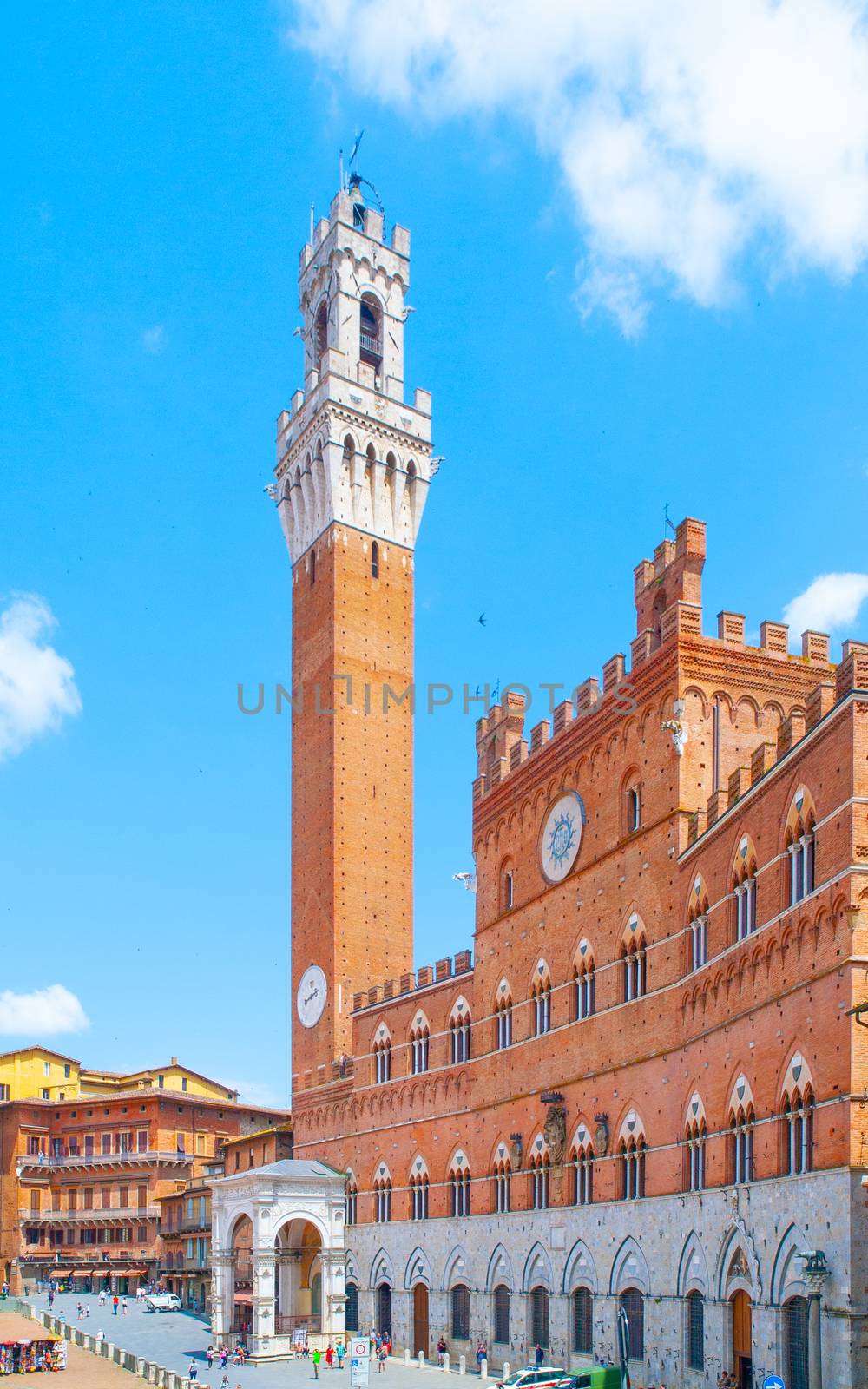 Bell tower, Torre del Mangia, of the Town Hall, Palazzo Pubblico, at the Piazza del Campo, Siena, Italy by pyty