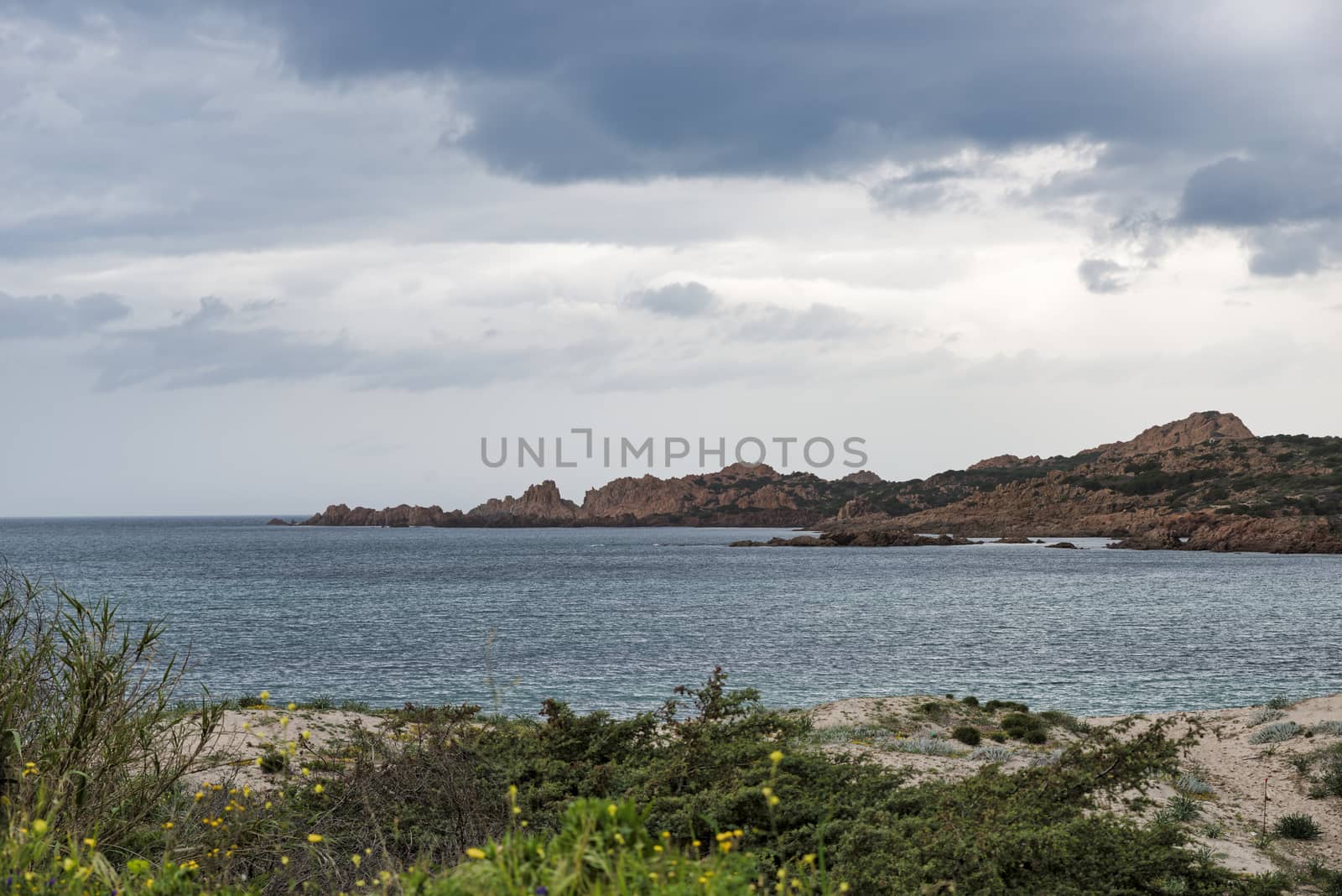 the rocks of isola rossa sardinia by compuinfoto
