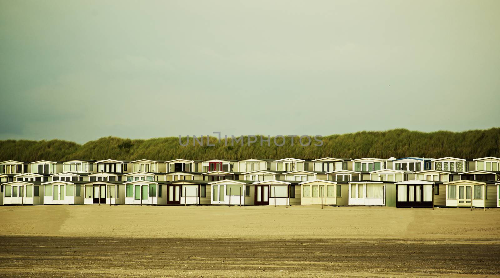 Beach Houses on North Sea coast in Netherlands Outdoors. Retro Styled