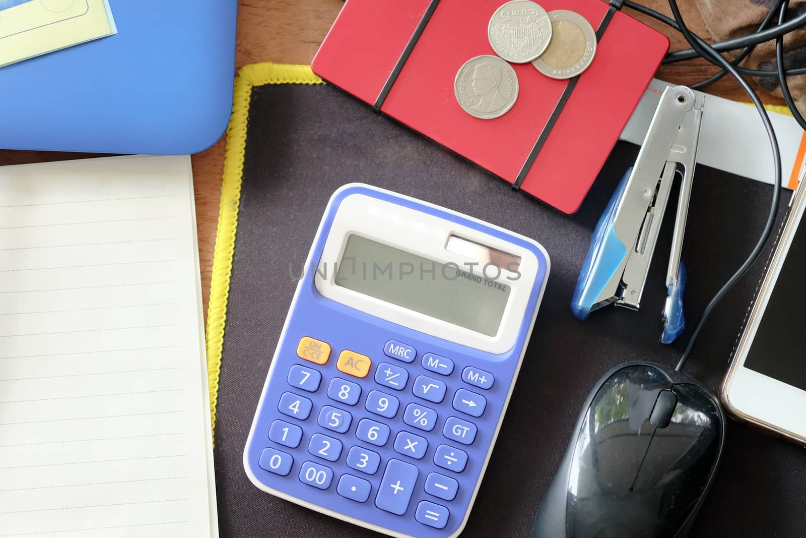 Top view of office supplies on a wooden table background,  Business workplace and business objects.