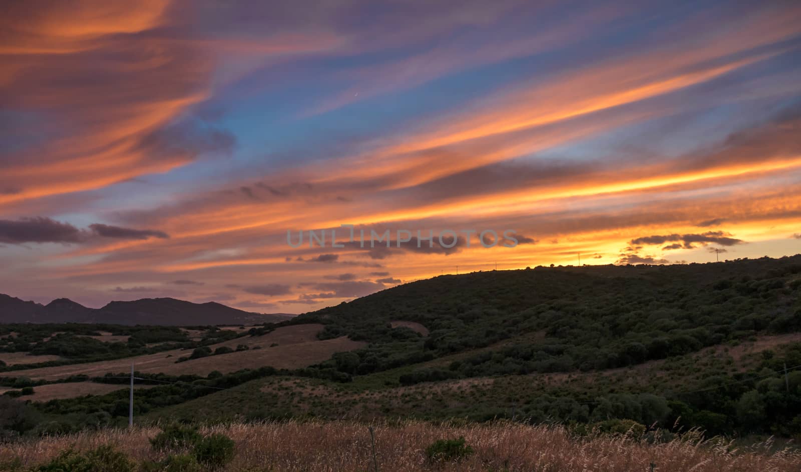 Sun Setting beyond Palau in Sardinia by phil_bird