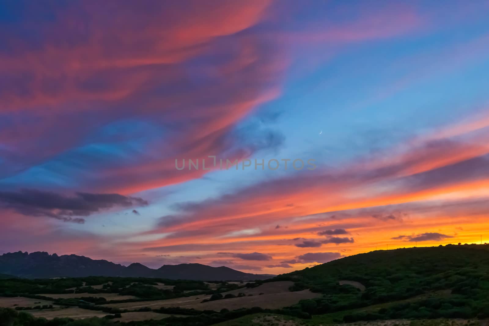 Sun Setting beyond Palau in Sardinia by phil_bird