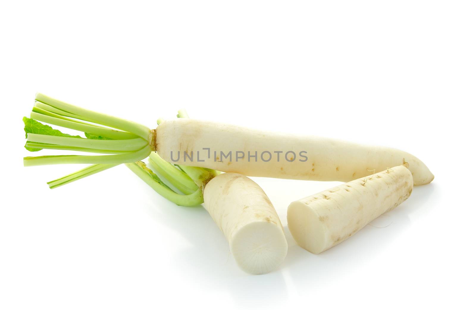 Daikon radishes isolated on white background