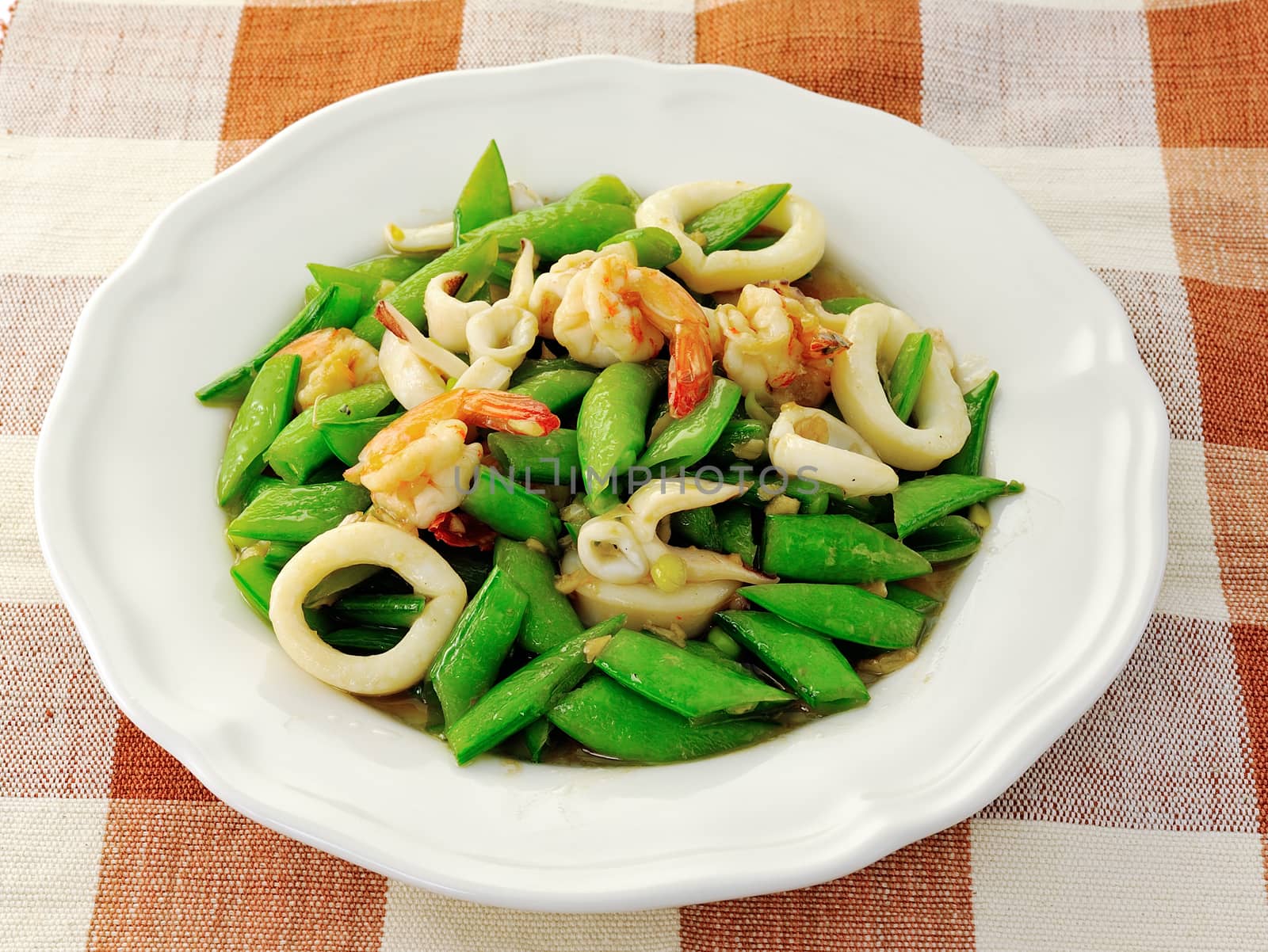 Seafoods - Shrimps,  Squids with green peas by sommai