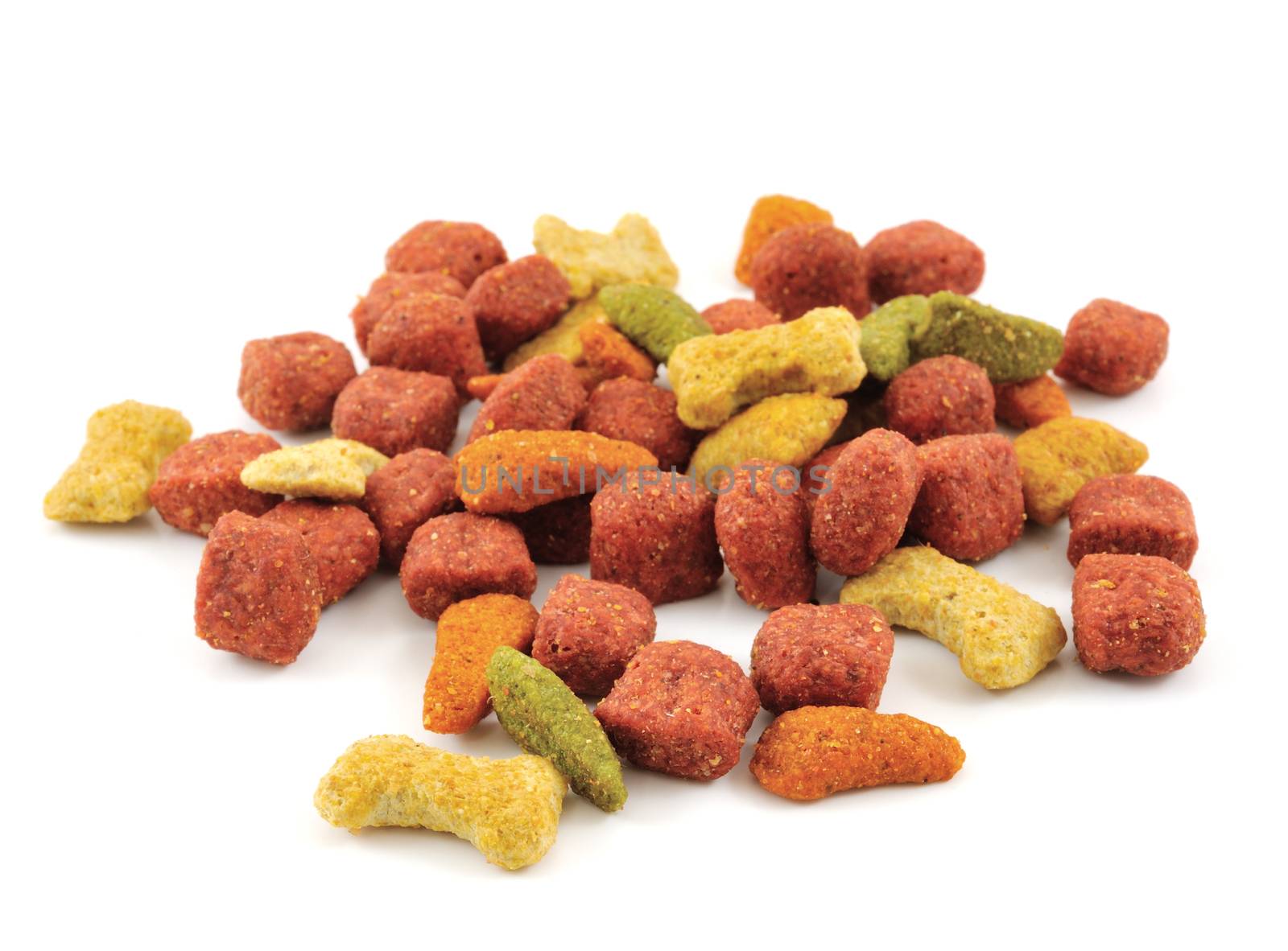 Dry dog food on white background. by sommai