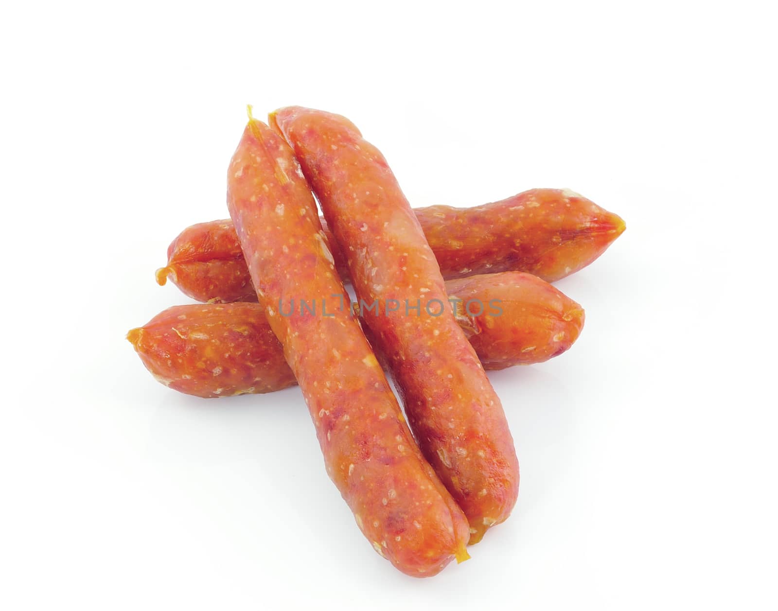 sausages on a white background by sommai