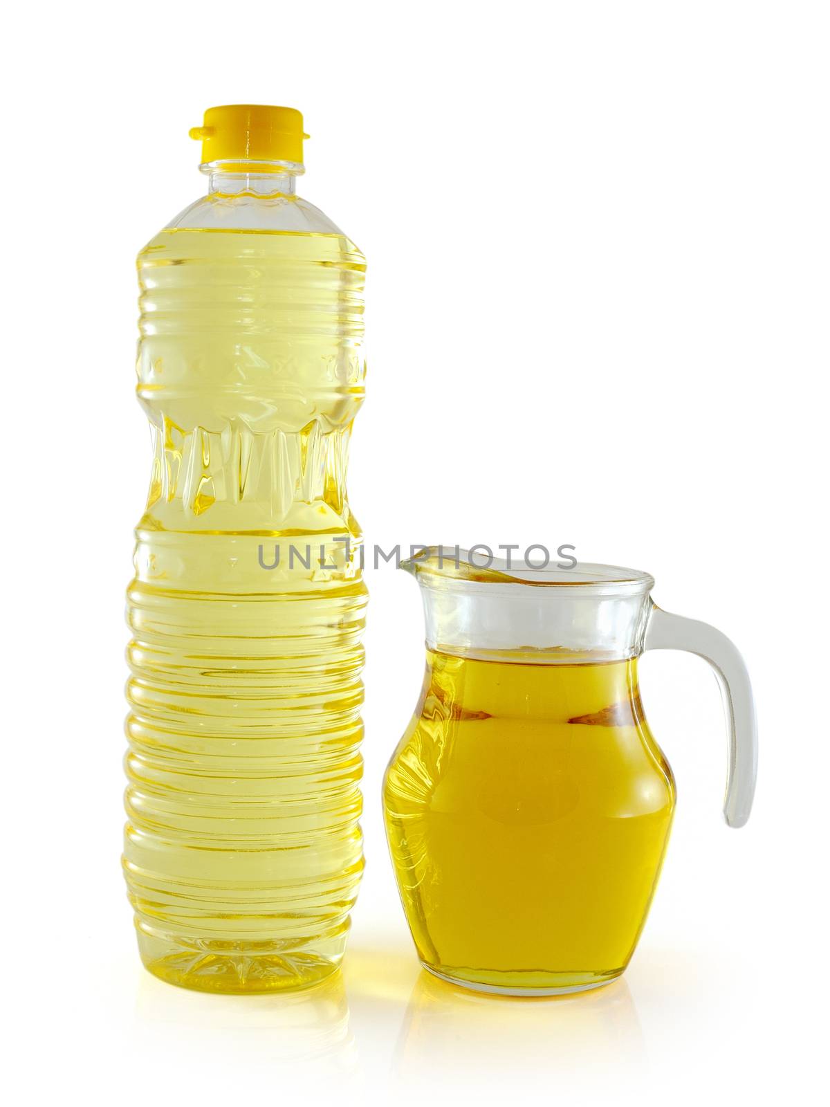 vegetable oil in a plastic bottle and jar on white background by sommai