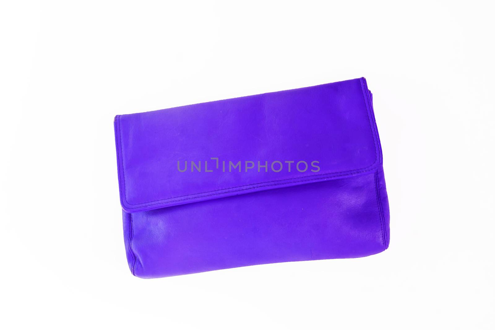 colorful fashionable clutch bag isolated on white background by Tanacha