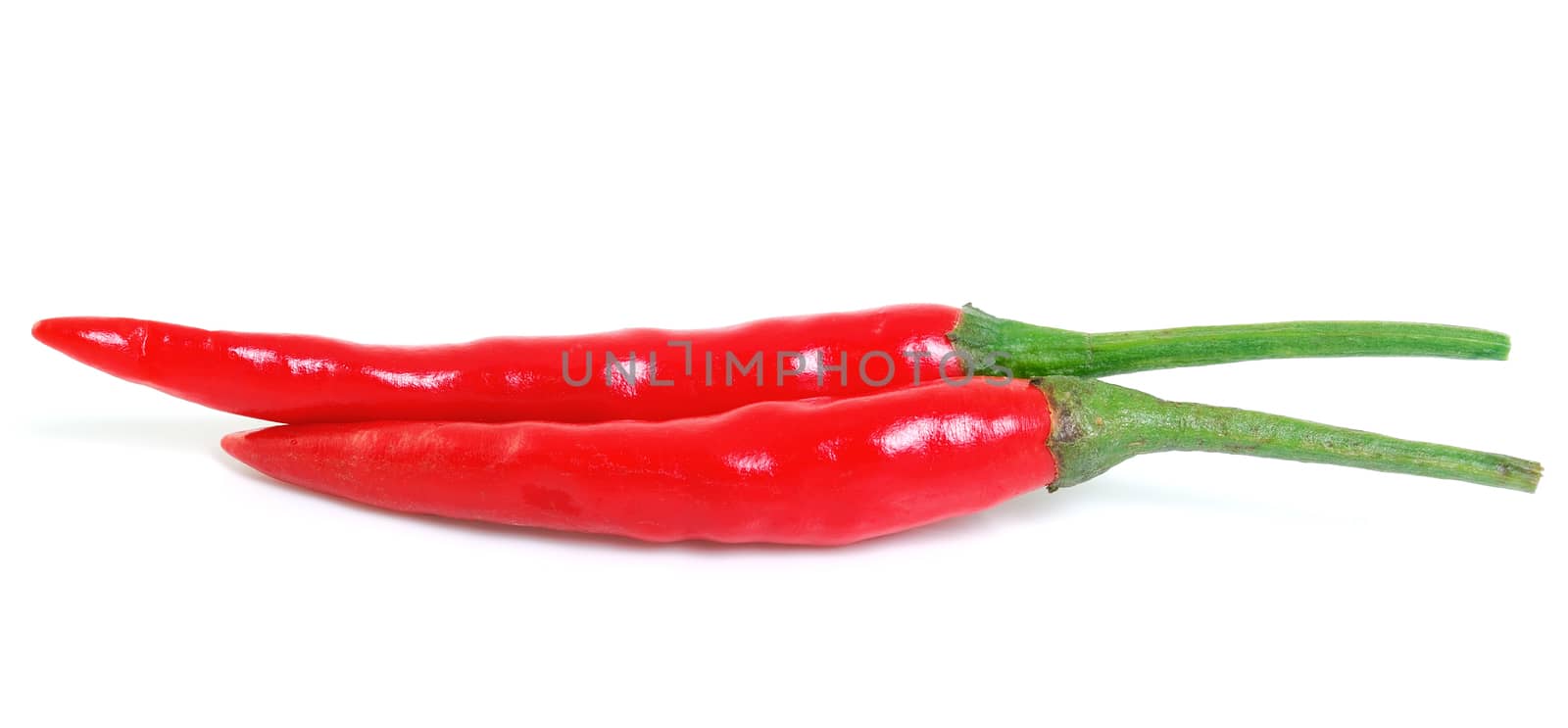 red hot chili pepper isolated on a white background by sommai
