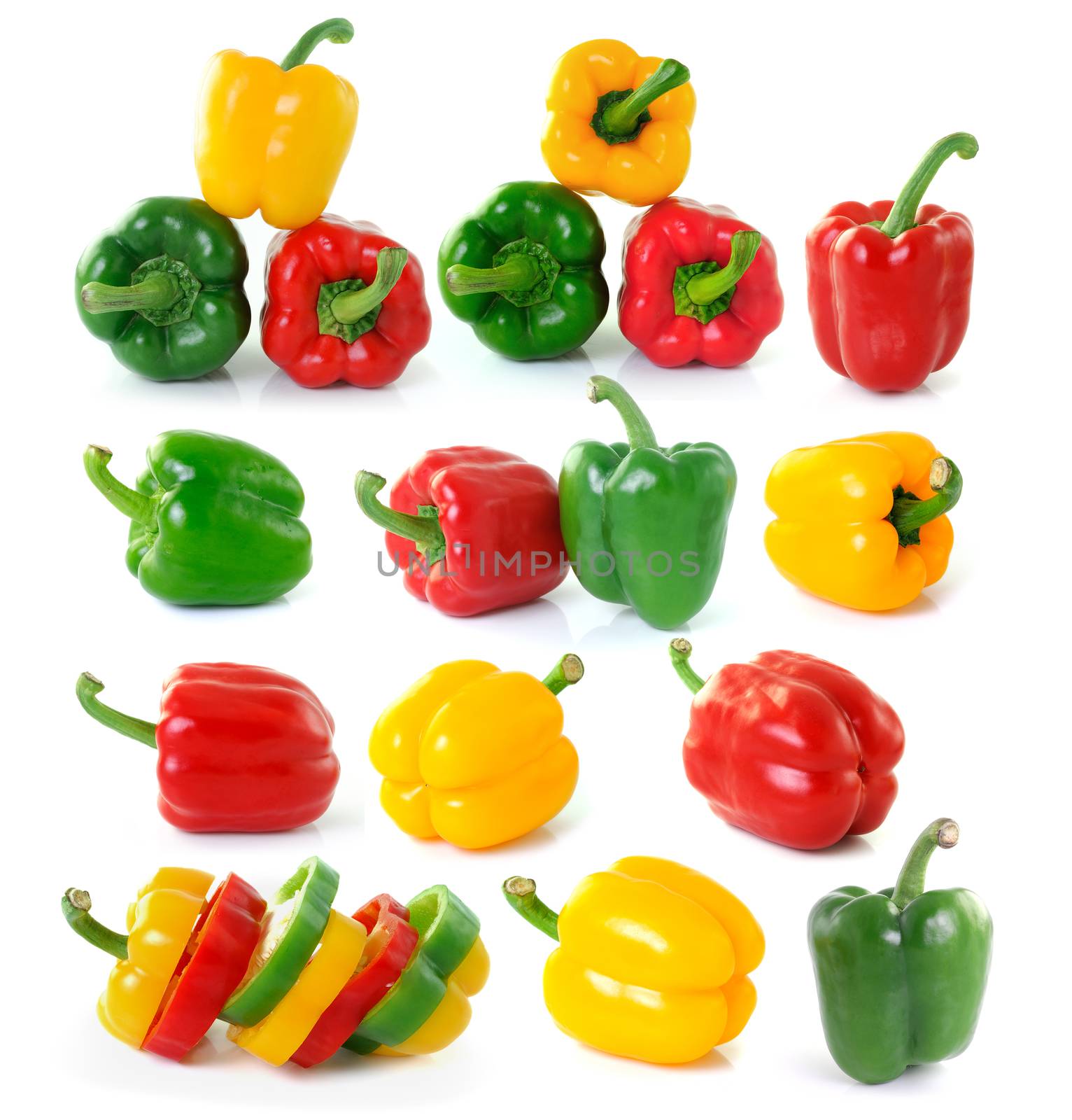 green yellow red pepper on white background