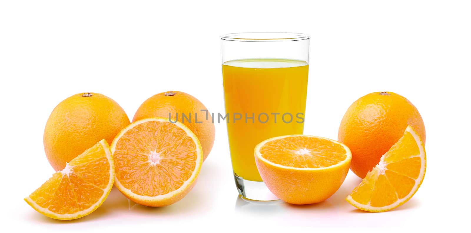 Fresh orange and glass with juice by sommai