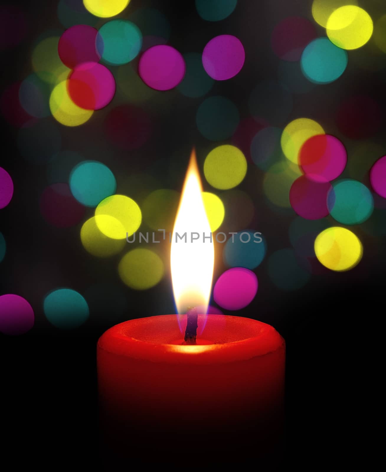 candle flame at night with bokeh