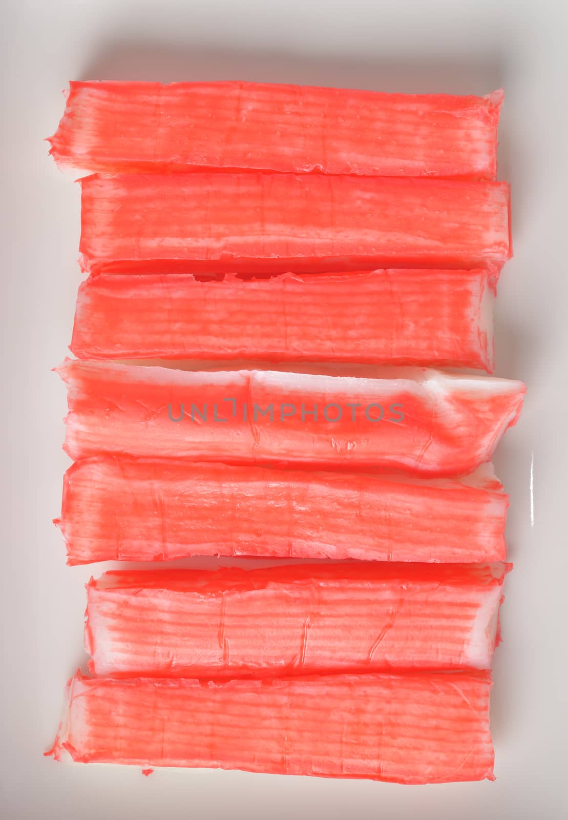 decorate crab stick in white plate by sommai