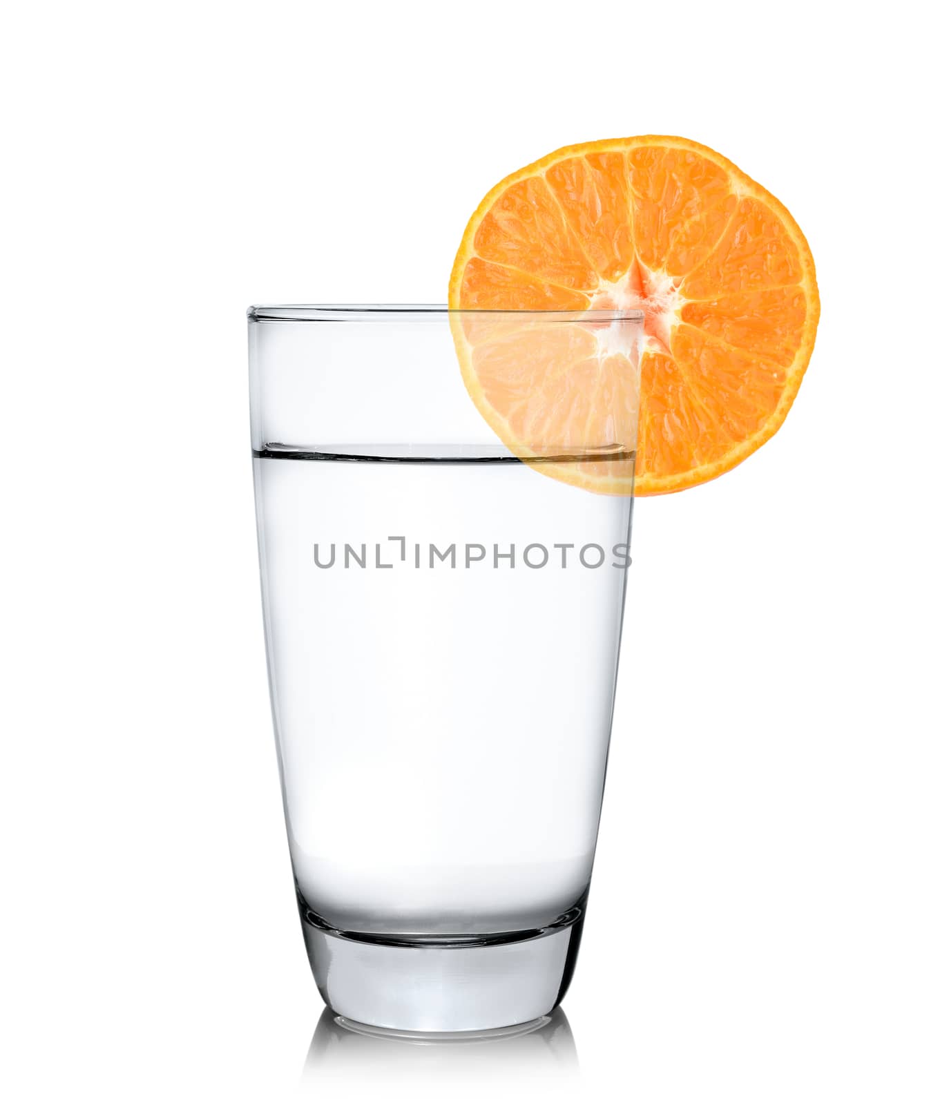 Glass of water with orange fruit by sommai