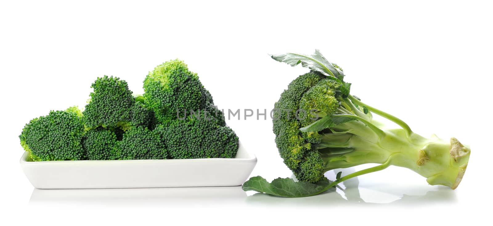 Fresh broccoli on white background by sommai