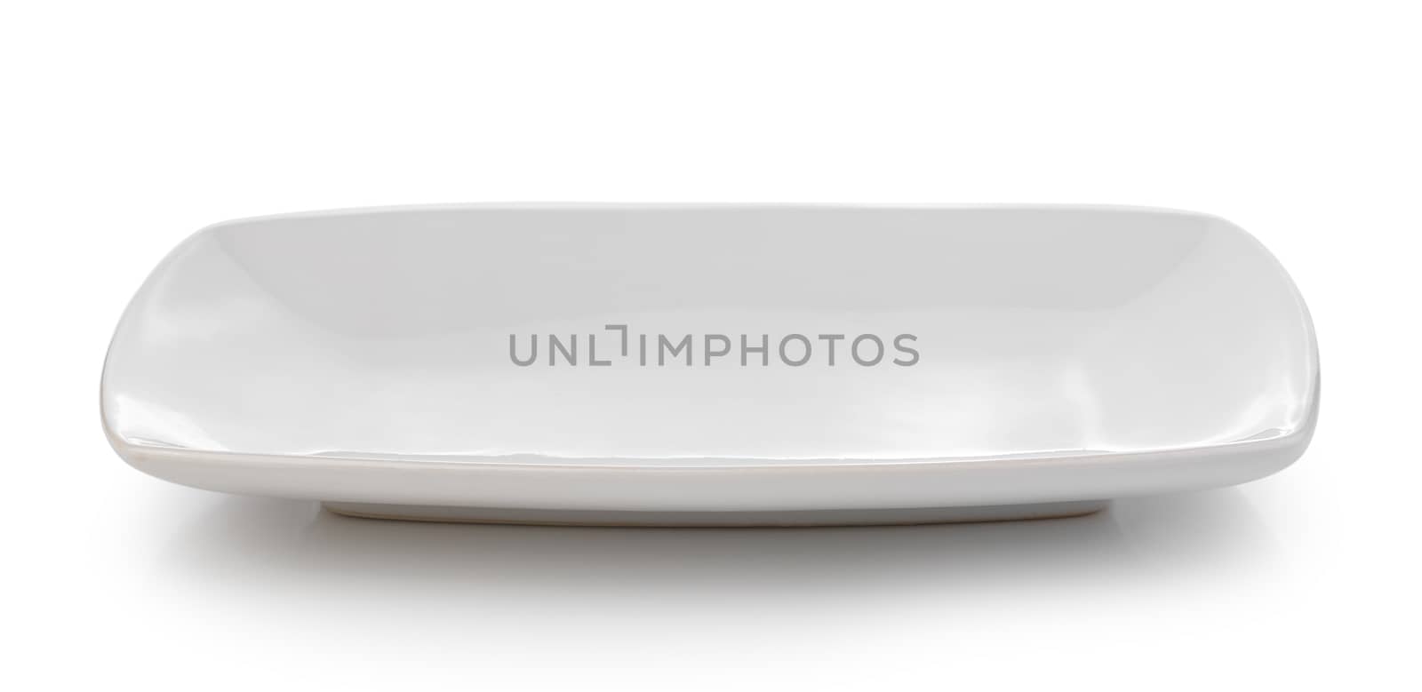 white plate on white background by sommai